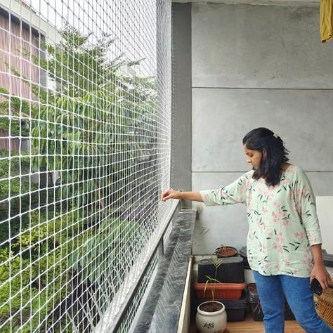 Balcony safety nets installed on apartment building in Hyderabad by JNS Safety Nets - 10000+ installations